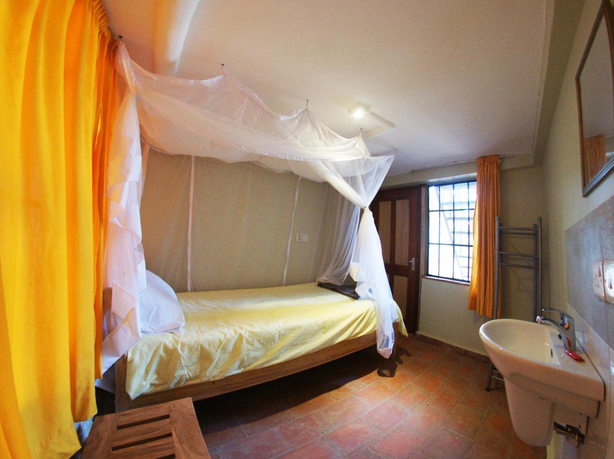 Yellow Haven Lodge Kampala Quarto foto